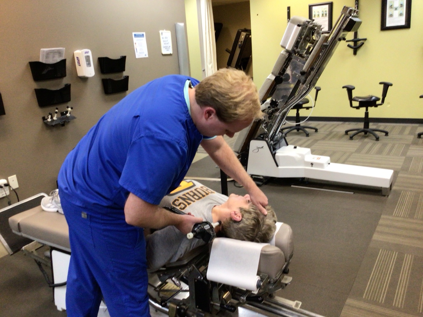 A chiropractic adjustment in progress