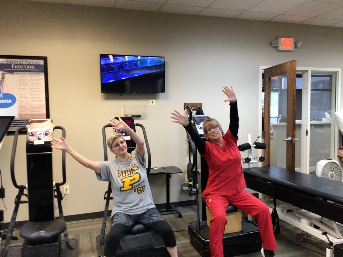 A patient guided through rehabilitation exercise